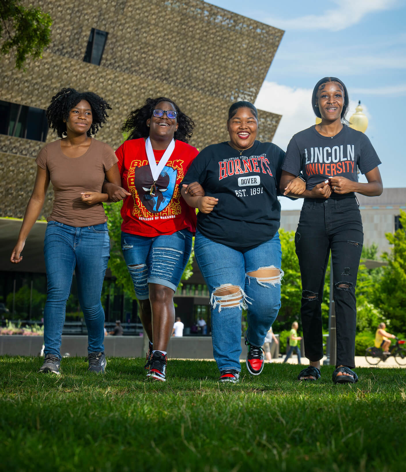 2022 CSF-DC Scholars walk arm-in-arm on campus
