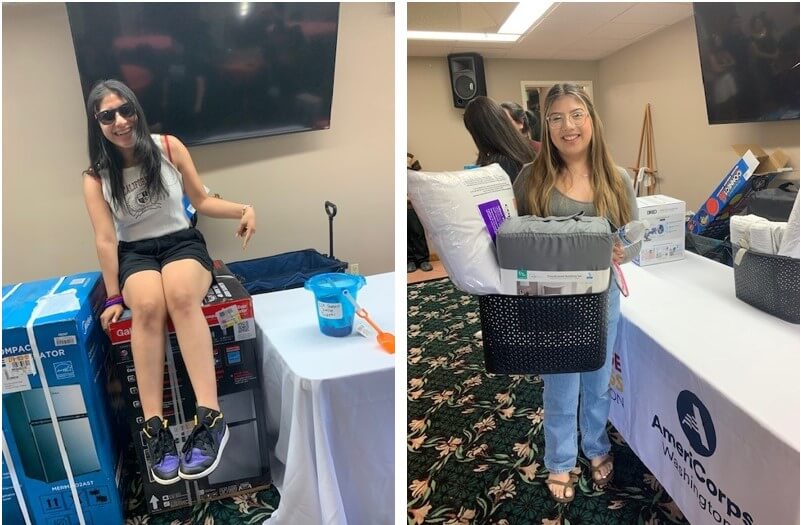 Two raffle-winning students with their prizes